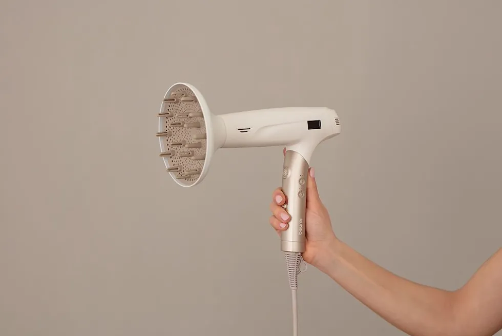 Beurer Phon Pieghevole 1600W 4Acc Aggancio Magnetico Crema